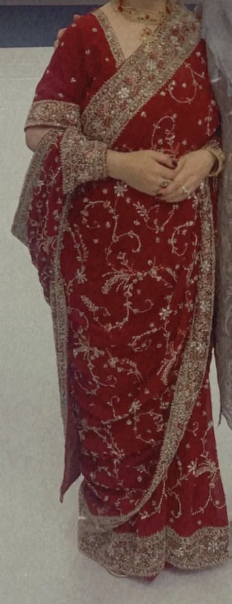 Red and gold saree — image 1
