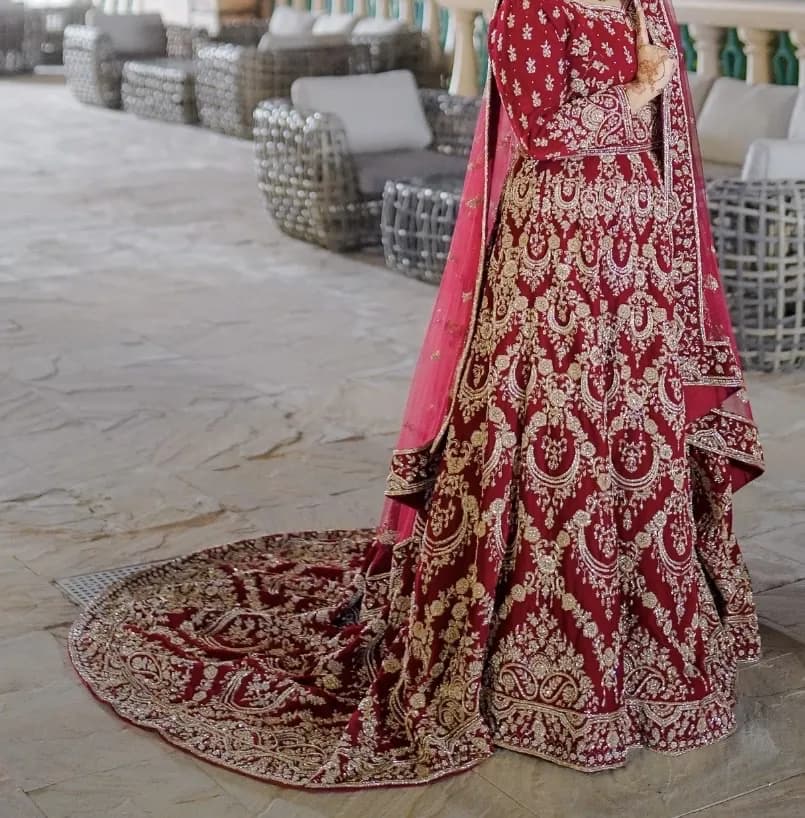 Red bridal lehnga with trail — image 1