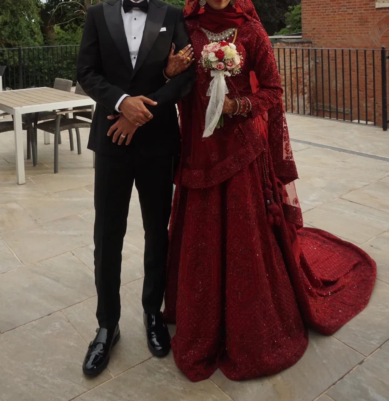 All red Bridal Lengha with veil and trail — image 1