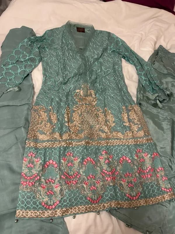 gorgeous 3 piece light blue suit. kameez has embroidery and tassel arms, size me — image 1