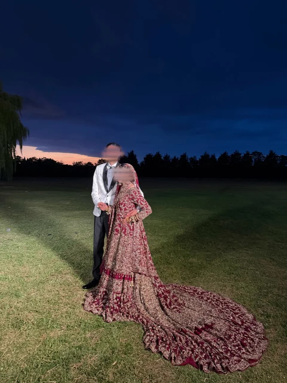 Red bridal lengha with dubatta and potli — image 1