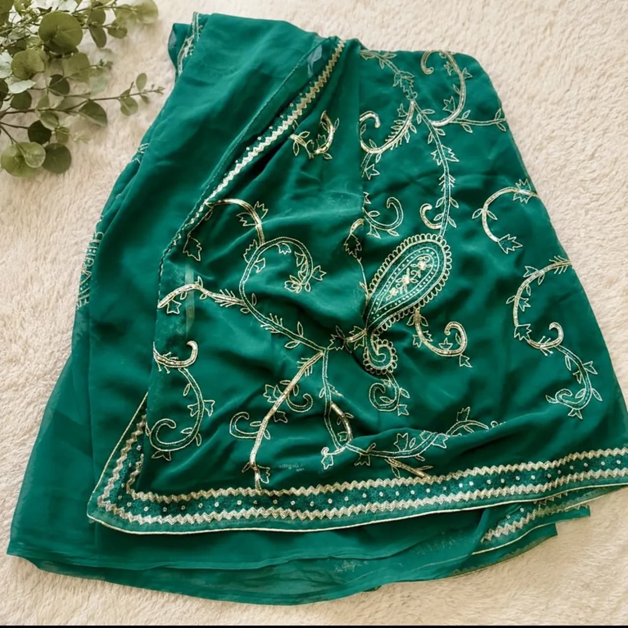 Brand new emerald green sari with gold paisley embroidery