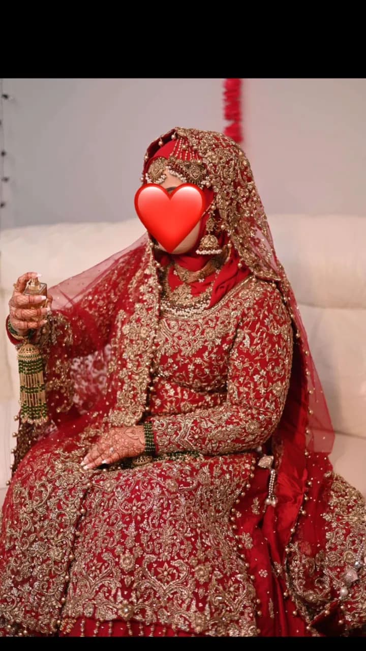 Red bridal lengha with heavy embroidery