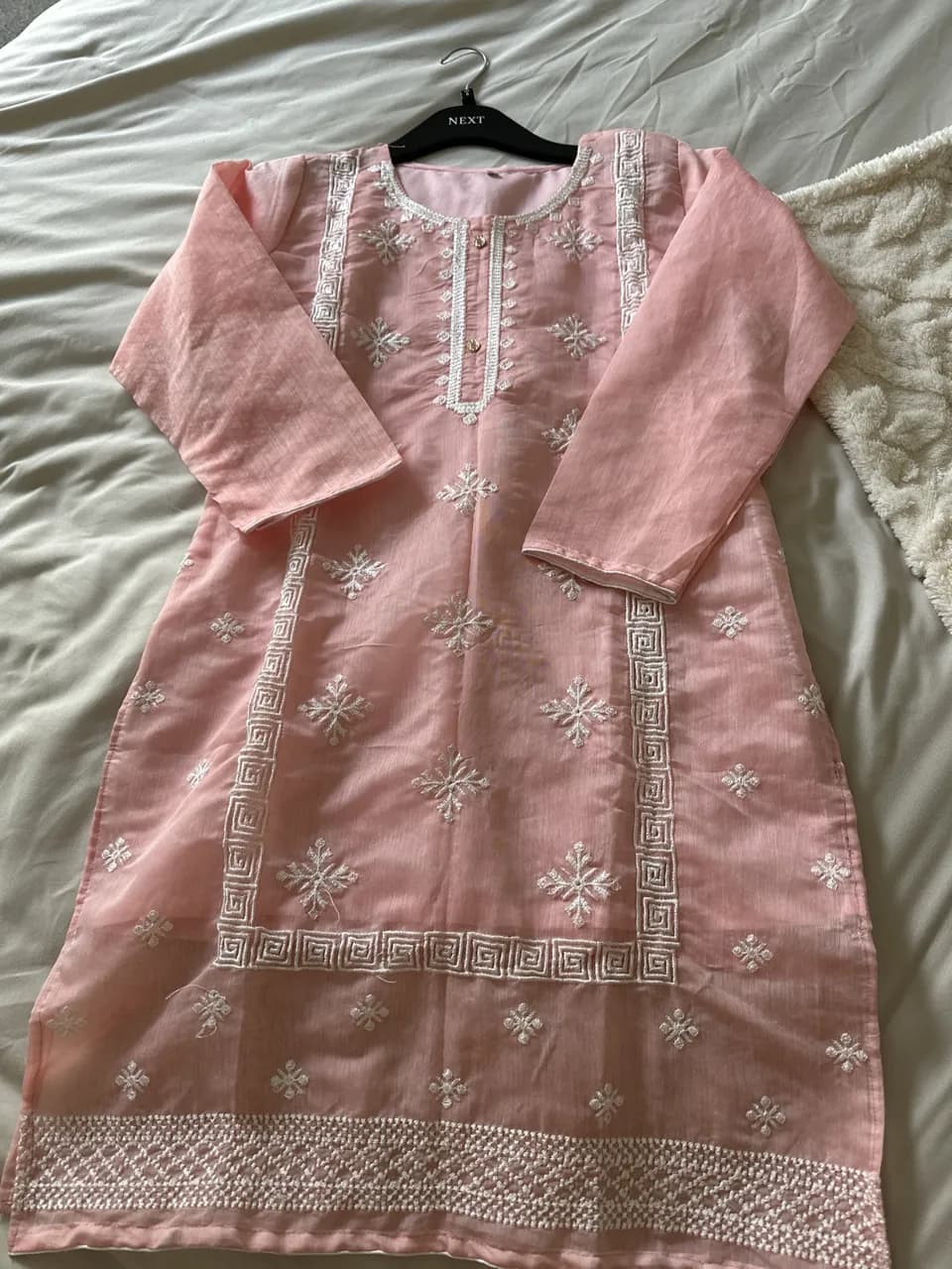 kameez with white stitching and gold stud buttons