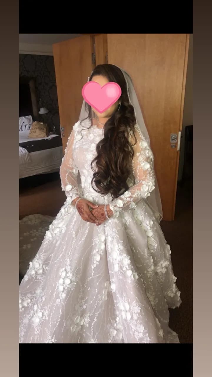 Champagne pink undertoned and white bridal dress — image 1