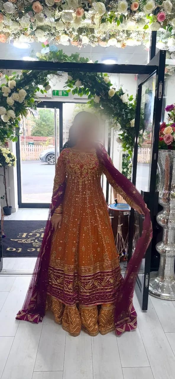 Farah Talib Aziz dress