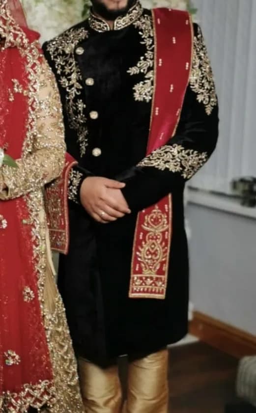 Groom Black and gold Sherwani - with red scarf — image 1