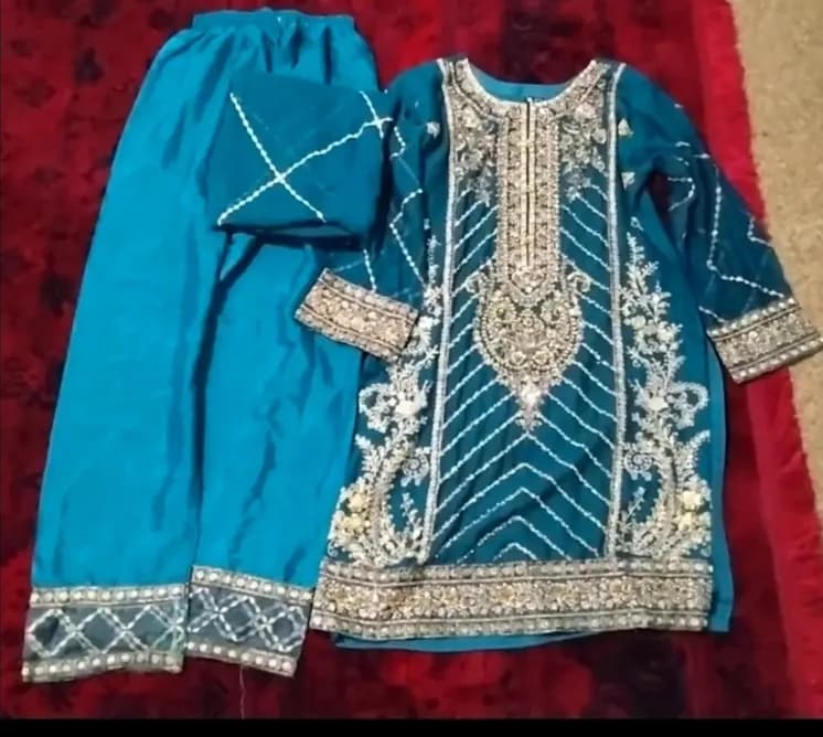 Blue floral gold design on it — image 1