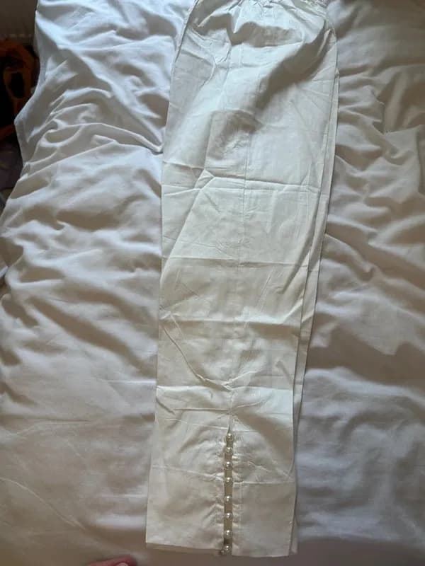 Large white trousers with pearl bottom — image 1
