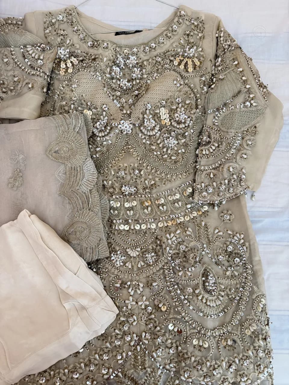 Heavy beaded gold suit