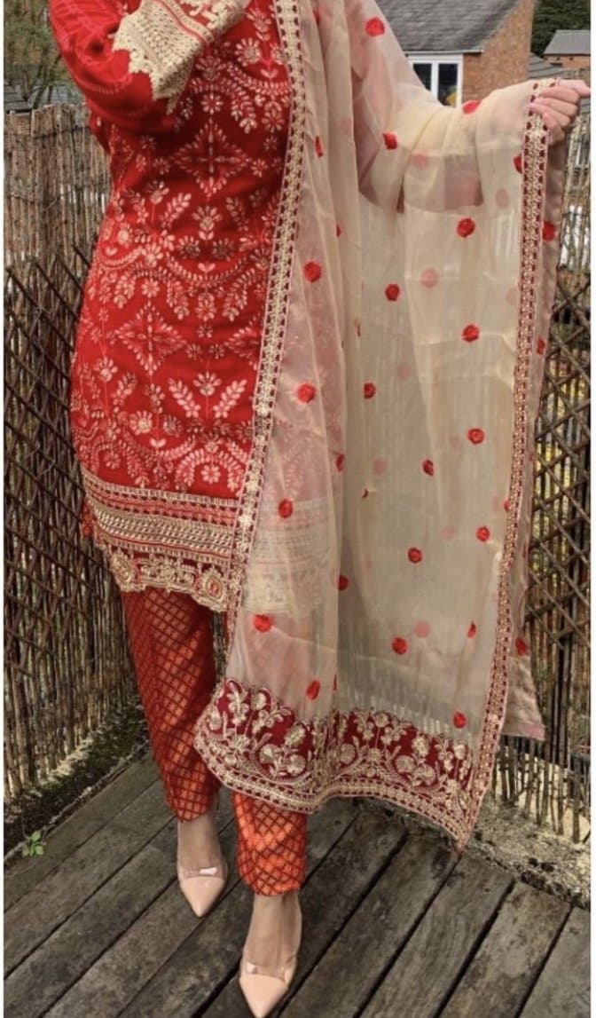 Bright Red with a hint of Orange with Gold work. Salwar Kameez — image 1