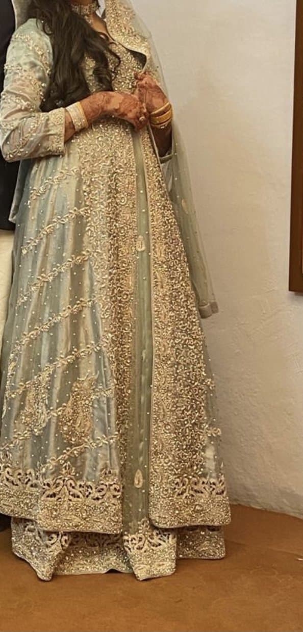 Mint green/ice blue colour wedding dress lengha with trail — image 1
