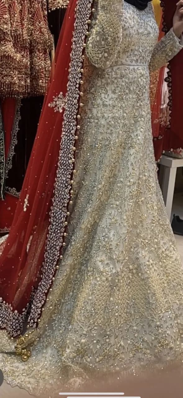 cream longwhite wedding dress with red Duppata. open to offers. — image 1