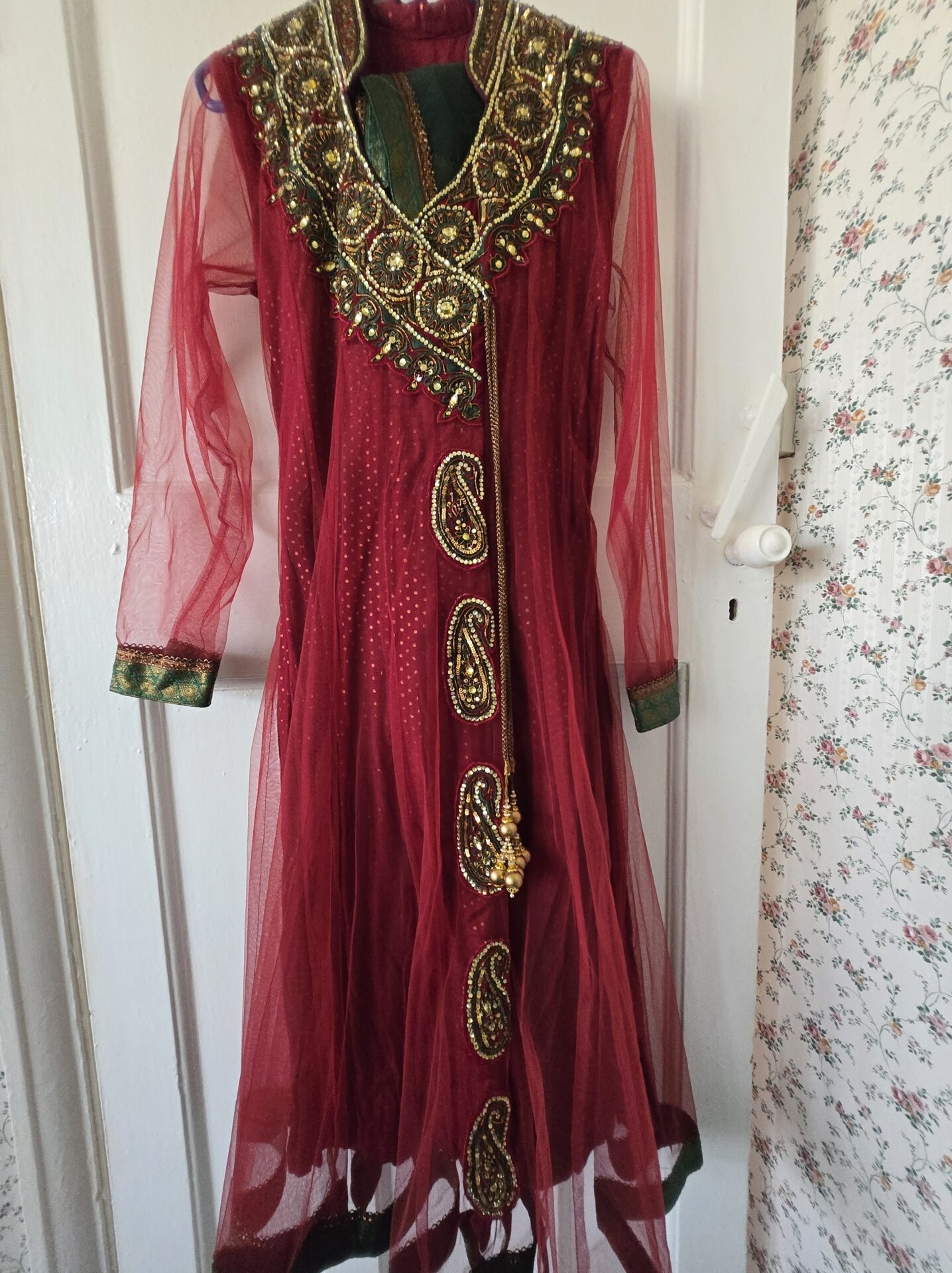 Green and red suit for mendi event