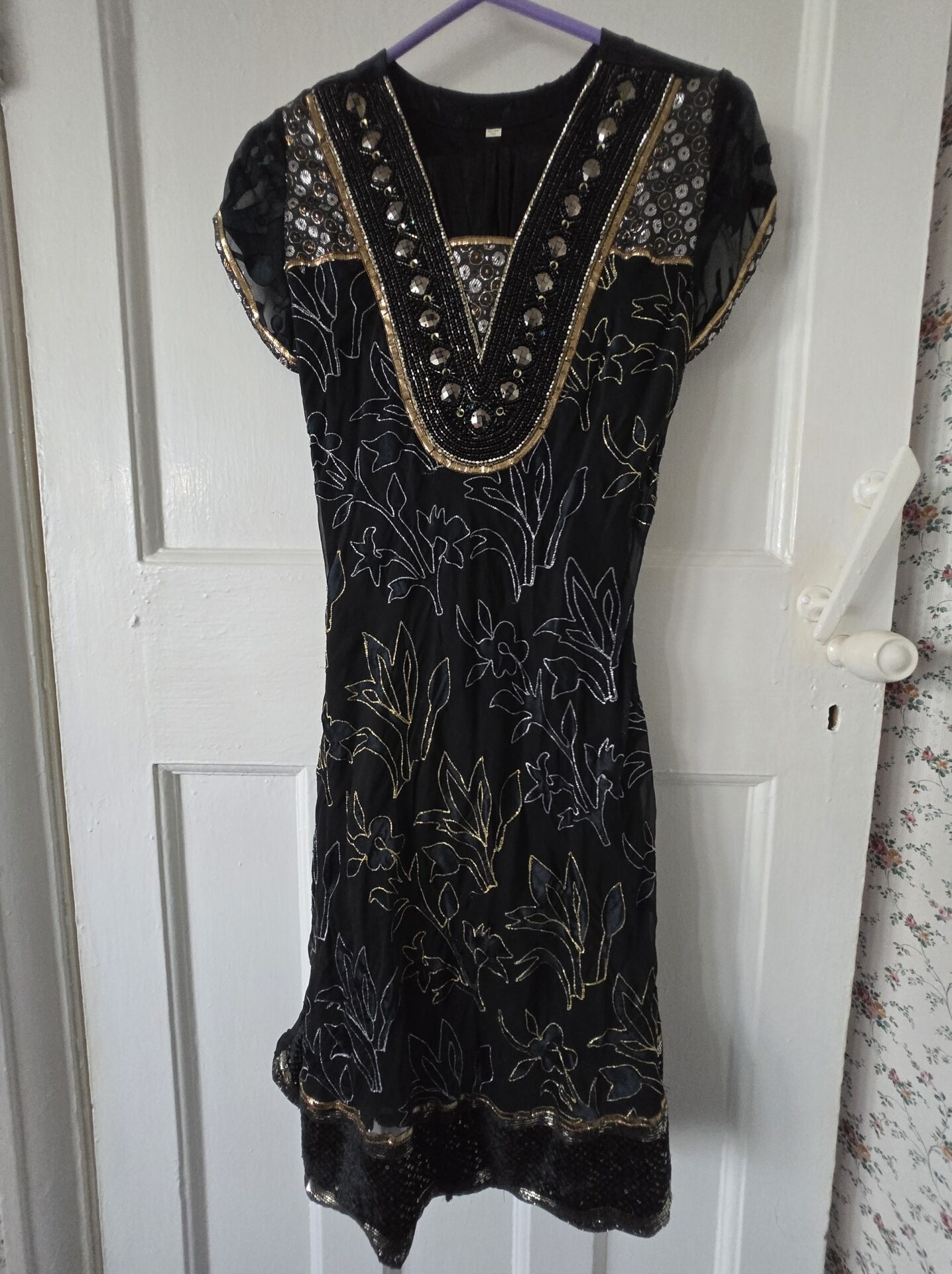 Black suit with silver and gold embroidery