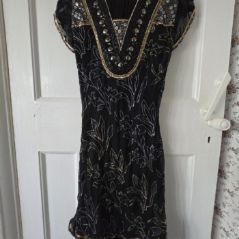 Black suit with silver and gold embroidery