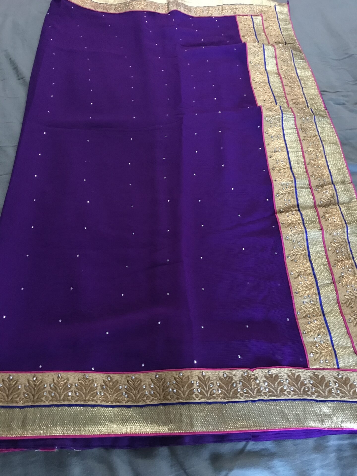 Purple and gold border saree