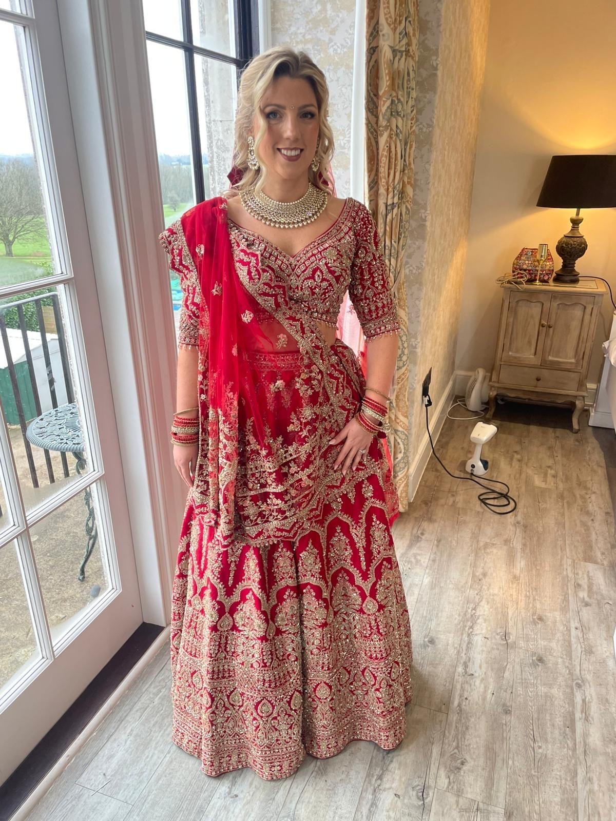 Red and gold wedding lengha