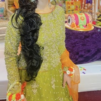 Green and orange Mehndi outfit – lehnga, choli and duppatta