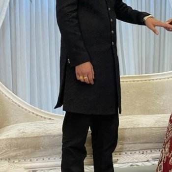 Black shirwani with gold buttons