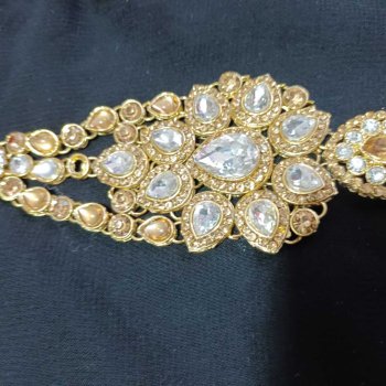 Heavy maang tika and heavy earrings