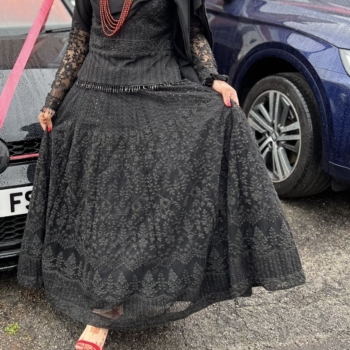 Party wear Black sequinned netted top with long skirt