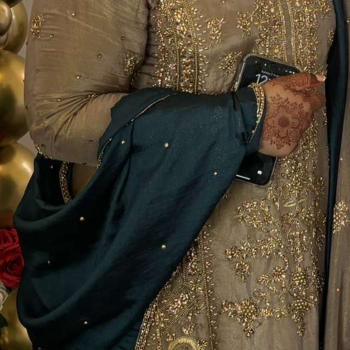 Teal and gold wedding guest outfit