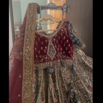 Bridal lehenga in teal gold and burgundy – rajistani style