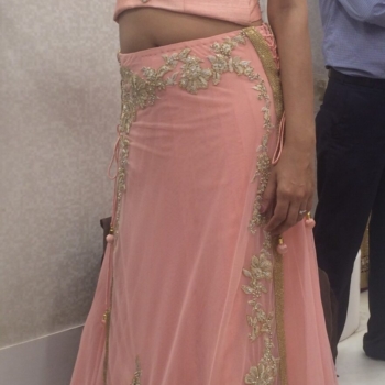Light pink lehanga, with halter neck blouse
