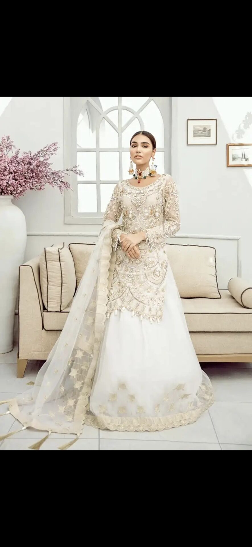 Embroidered net lengha