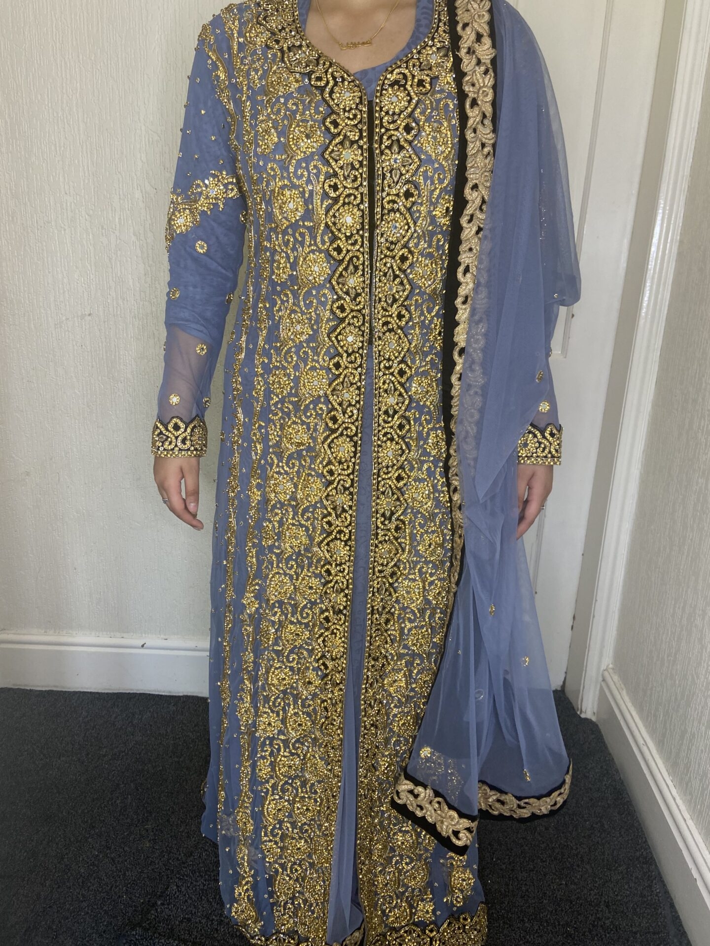 blue and gold heavily embroidered jacket suit