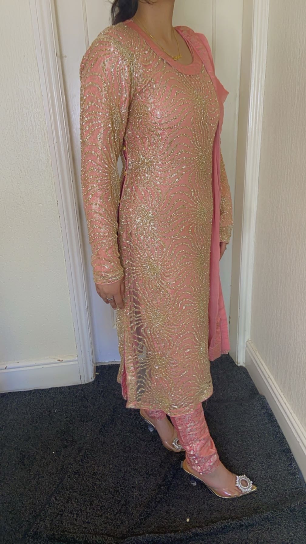 pink and gold suit