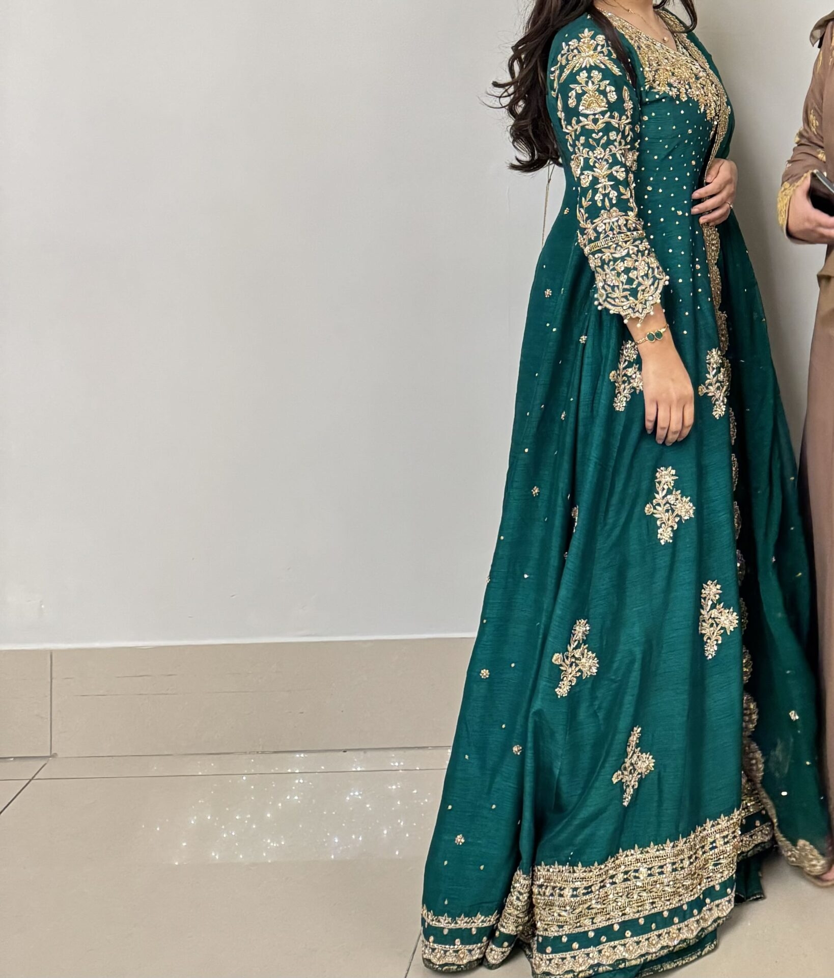 Emerald Green Anarkali dress with gold detailing