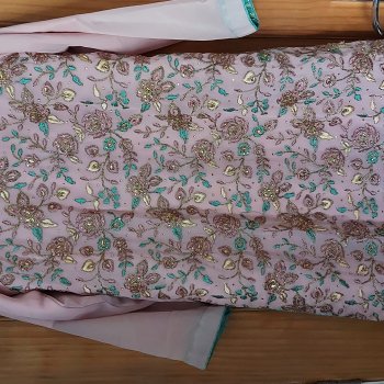 light pink suit with sea green lehnga