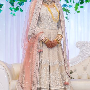 Ivory and blush pink Indian bridal wedding lengha dress