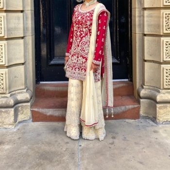Women’s red and cream wedding dress